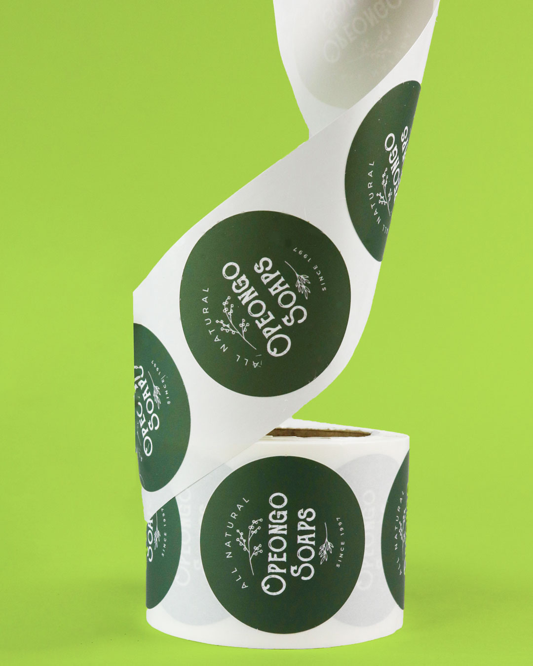 An image of custom circle labels featuring the Opeongo Soaps logo.